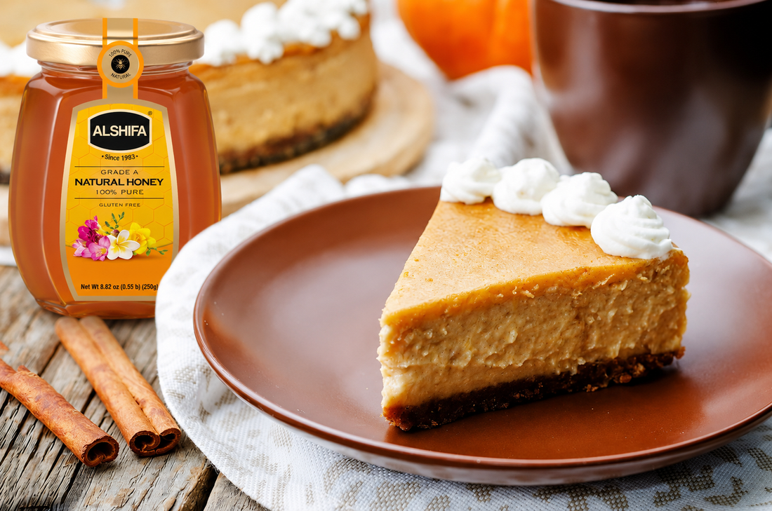 Slice of honey cream pumpkin pie topped with whipped cream beside a jar of ALSHIFA Natural Honey